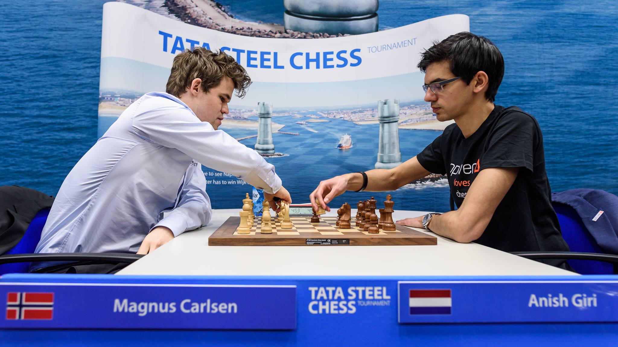 The week in chess live games. Хоу Ифань Магнус Карлсен. Магнус Чесс. Magnus Carlsen Tata Steel. Хоу Ифань и Магнус.